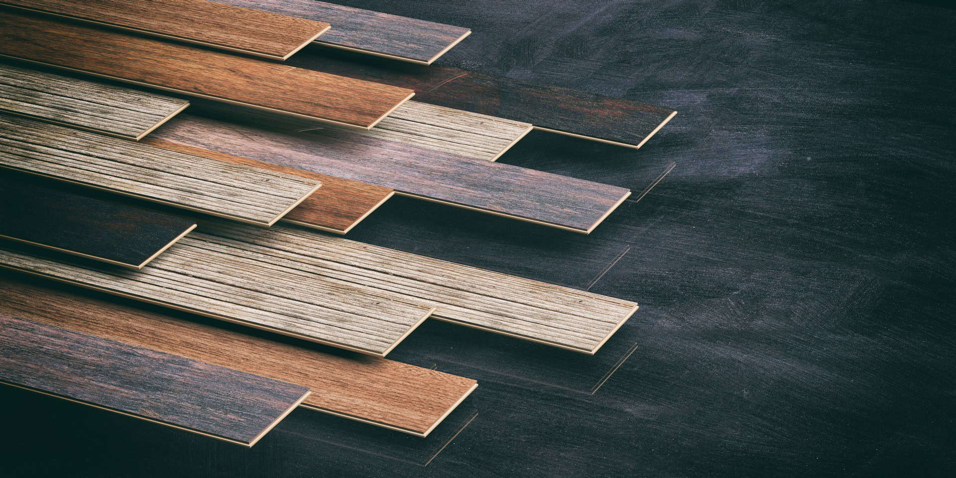 Selection of luxury laminate on dark flooring